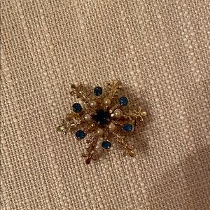 Elegant Gold and Blue Brooch